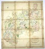 A linen backed folding hand coloured map of Gloucestershire Divided into Hundred.