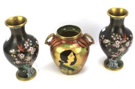 A pair of Chinese cloisonne enamel vases and another.