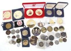 An assortment of mostly commemorative coins.