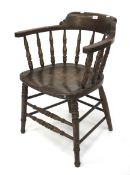 A Victorian oak smoker's bow chair.