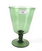 A 20th century green glass vase.