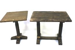 Three vintage wooden pub tables.