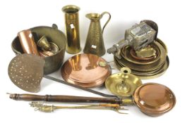 An assortment of brassware and other metalware.