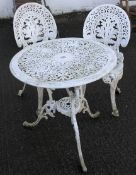 An early 20th century white painted aluminum garden table and two chairs.