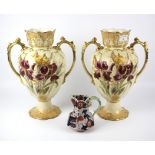 A pair of large early 20th century iris vases and small jug.
