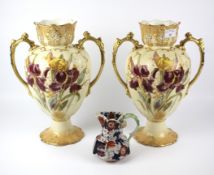 A pair of large early 20th century iris vases and small jug.