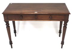 A Victorian two drawer mahogany desk.