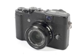 A Fujifilm X10 digital camera. With a 28-112mm 1:2.0-2.8 Fujinon Aspherical lens.