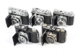 Five Kodak Retina 35mm cameras.