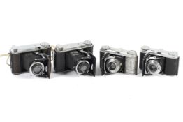 Four Voigtlander folding cameras.