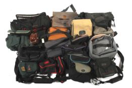 A group of modern camera bags and varying styles and sizes