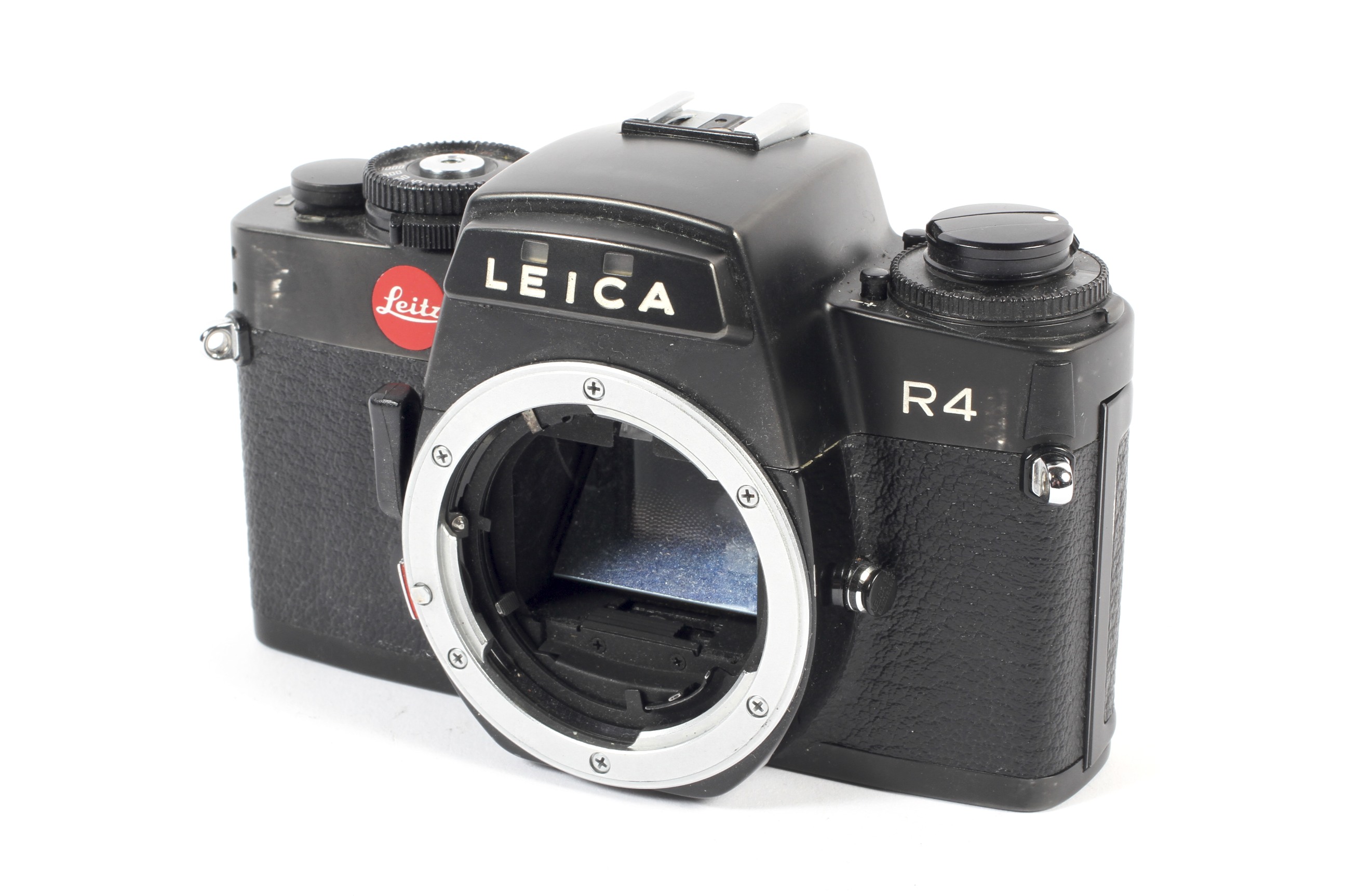 A black Leica R4 35mm SLR camera body.