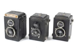 Three Voigtlander Brilliant 6x6 medium format TLR cameras.