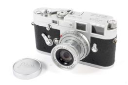 A Leica M3 35mm rangefinder camera. With a 50mm 1:2.