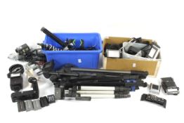 A collection of camera accessories and camera parts.