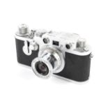 A Leica IIIf 35mm rangefinder camera, chrome, 1954. With a 50mm 1:3.5 Leitz Elmar lens.