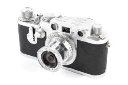 A Leica IIIf 35mm rangefinder camera, chrome, 1954. With a 50mm 1:3.5 Leitz Elmar lens.