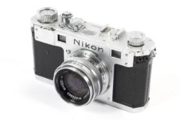 A Nikon S 35mm rangefinder camera. With a Nikkor-H.