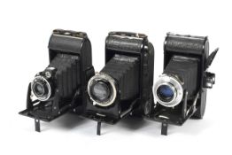 Three Voigtlander Bessa folding cameras.