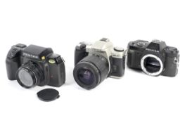 Three Pentax 35mm SLR cameras. To include an MZ-30 with a 28-80mm 1:3.