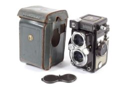 A Yashica 44 LM 4x4 TLR camera. With a 60mm 1:3.
