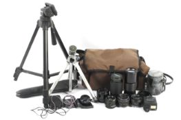A collection of camera lenses and accessories. To include a 28mm 1:2.