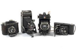 Four Voigtlander folding cameras. To include a Virtus with 75mm 1:3.