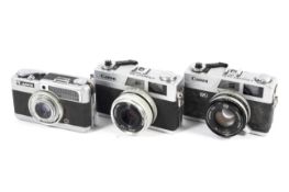 Three Canon 35mm cameras. To include a Canonet QL19 rangefinder with a 45mm 1:1.