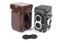 A Rolleiflex T 6x6 medium format TLR camera. With a Carl Zeiss 75mm 1:3.