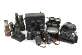 An assortment of binoculars and similar items.