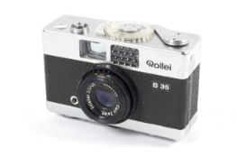 A Silver Rollei B35 35mm rangefinder camera. With Triotar 40mm 1:3.5 Carl Zeiss lens.