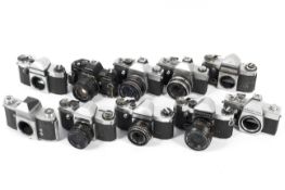 A collection of ten Praktica 35mm SLR cameras.