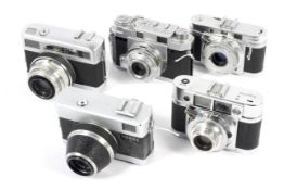 Five 35mm rangefinder cameras.