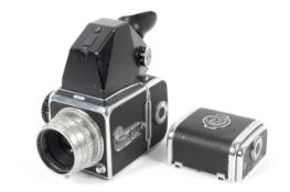 A Hasselblad 1000F medium format camera. With an 80mm 1:2.
