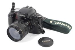 A Canon EOS Elan 35mm SLR camera.