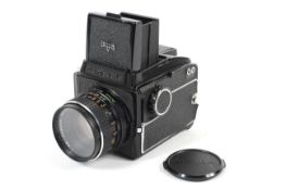 A Mamiya 645 medium format camera. With waist level finder and 80mm 1:2.