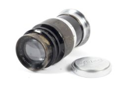 A Leitz Leica 90mm 1:4 elmar camera lens,. Black, M39 screw mount.