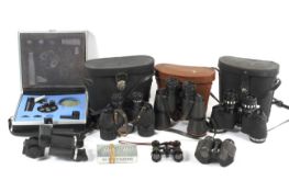 An assortment of vintage binoculars.