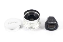 A Voigtlander camera lens and a 25mm shoe mount viewfinder.
