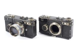 Two Zeiss Ikon Contax I 35mm rangefinder cameras. One with a 50mm 1:1.