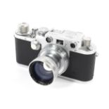 A Leica IIIf 35mm rangefinder camera, chrome, 1952-53. With a 50mm 1:2 Summitar lens.