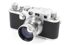 A Leica IIIf 35mm rangefinder camera, chrome, 1952-53. With a 50mm 1:2 Summitar lens.