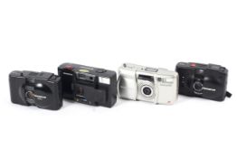 Four Olympus 35mm point and shoot cameras.