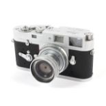 A Leica M2 35mm rangefinder camera. With 50mm 1:2.