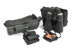 A spotting scope and three pairs of binoculars.