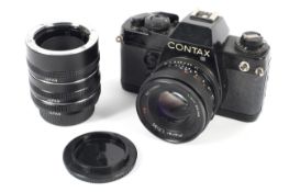 A Contax 139 quartz camera. With Carl Zeiss Planar 50mm 1.7 lens and Contax extension tubes.