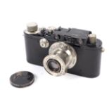 A Leica III 35mm rangefinder camera, black, 1935. With a 50mm 1:3.5 Leitz Elmar lens.