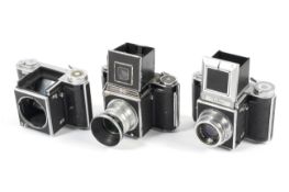 Three Agiflex 6x6 medium format cameras. One with an 80mm 1:2.