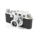A Leica IIIc 35mm rangefinder camera, chrome, 1950. With a 50mm 1:3.5 Leitz Elmar lens.