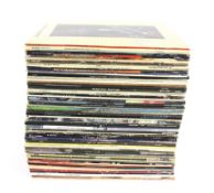 A collection of 1980s and later LP records.